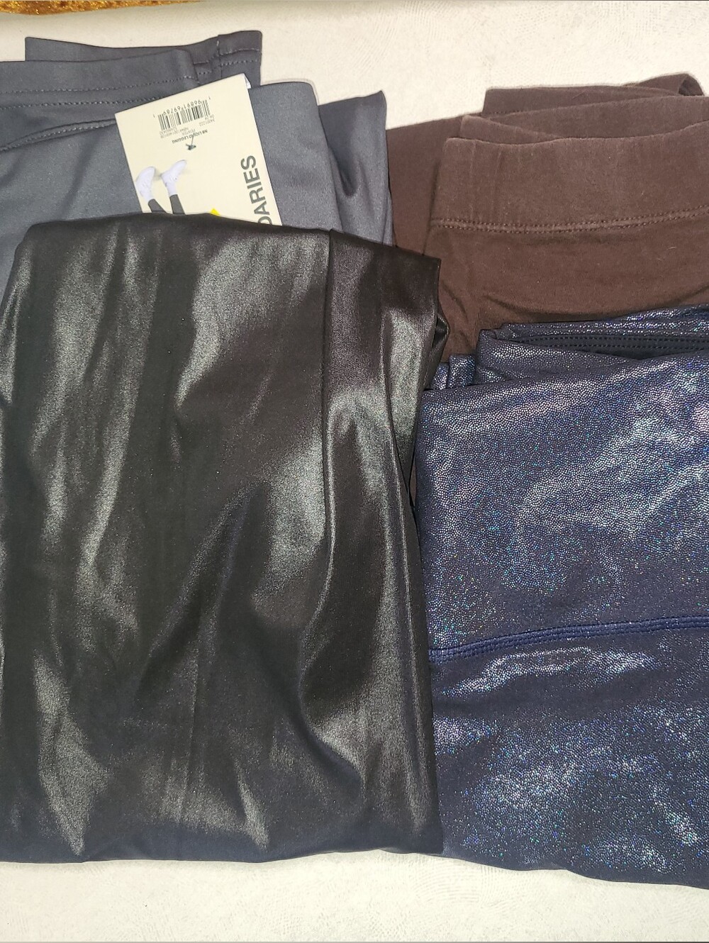 Lot of 4 Women’s Stretch Leggings Size Mwd 8-10 : 2 NWT 1 Like New Pair